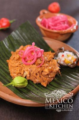  ¡El Cochinito Pibil de Valladolid: Una explosión de sabores ahumados y una fiesta cítrica en cada bocado!